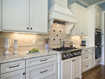 Bianco Romano Granite Countertop With White Cabinets