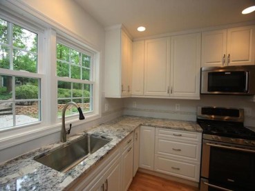 White Ice Granite With White Cabinet Backsplash Ideas